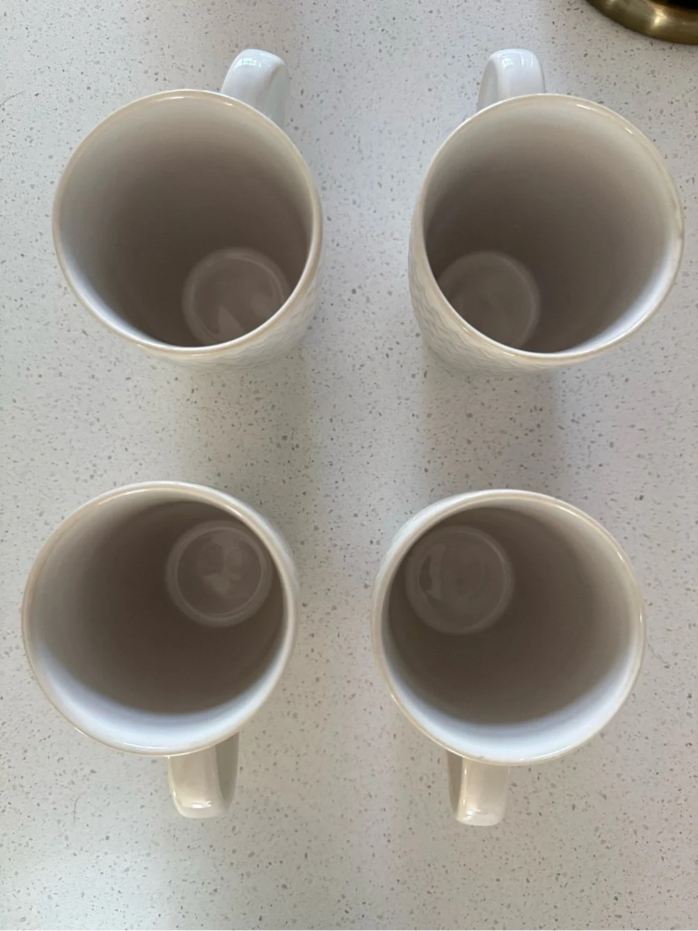 4 white basketweave Crate and Barrel mugs